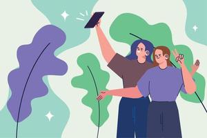 Frauen, die ein Selfie mit Blättern machen vektor