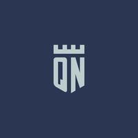 qn-logo-monogramm mit festungsschloss und schildstildesign vektor