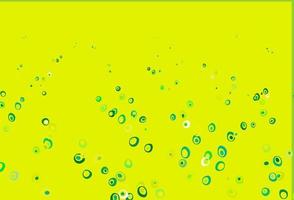 ljusgrön, gul vektorbakgrund med prickar. vektor