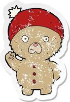 retro bedrövad klistermärke av en tecknad serie vinka teddy Björn i vinter- hatt vektor