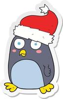 Aufkleber eines Cartoon-Pinguins mit Weihnachtsmütze vektor