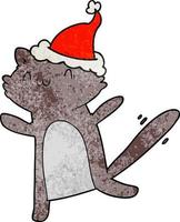 strukturierter Cartoon einer tanzenden Katze mit Weihnachtsmütze vektor