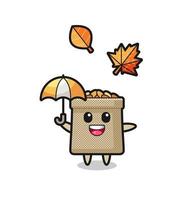 Karikatur des niedlichen Weizensacks, der im Herbst einen Regenschirm hält vektor
