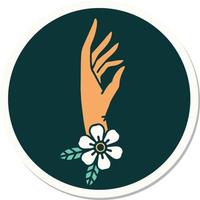 klistermärke av tatuering i traditionell stil av en hand och blomma vektor