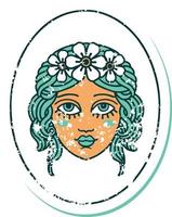 ikoniska bedrövad klistermärke tatuering stil bild av en jungfru med blommor i henne hår vektor