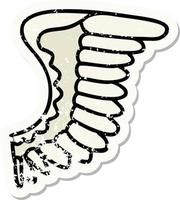 Distressed Sticker Tattoo im traditionellen Stil eines Flügels vektor