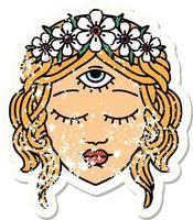 Distressed Sticker Tattoo im traditionellen Stil des weiblichen Gesichts mit drittem Auge und Blumenkrone vektor