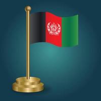 afghanische nationalflagge auf goldenem pfahl auf abgestuftem isoliertem dunklem hintergrund. Tischfahne, Vektorillustration vektor