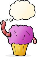 Cartoon-Wurm im Cupcake mit Gedankenblase vektor