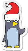 klistermärke av en tecknad serie pingvin i jul hatt vektor