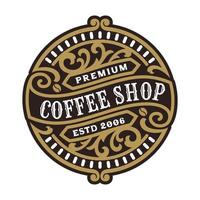 Café-Vintage-Luxusrahmen-Logo-Abzeichen mit gedeihendem viktorianischen Ornament vektor