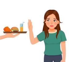 ung kvinna på diet vägrar till äta skräp mat tycka om friterad kyckling och burger vektor
