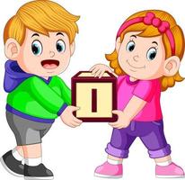 zwei kinder, die alphabetblock tragen vektor