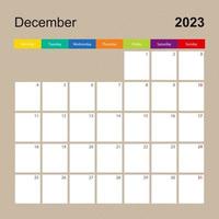 Kalenderblatt für Dezember 2023, Wandplaner mit farbenfrohem Design. Woche beginnt am Montag. vektor