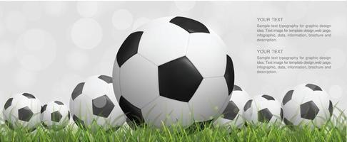 fotboll eller fotbollar i grönt gräs med bokeh vektor