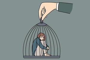 Gefangenschaftssklaverei und Freiheitskonzept. junge traurige depressive frau, die in einem käfig sitzt, der von einer riesigen menschlichen hand gehalten wird, die sie manipuliert, vektorillustration vektor