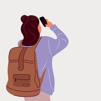 rückseite wanderer frau mit rucksack und fotografieren auf einem smartphone. Vektor-Illustration vektor