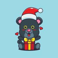 süßer panther glücklich mit weihnachtsgeschenk. nette weihnachtskarikaturillustration. vektor