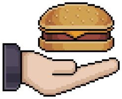 Pixelkunst-Hand, die Hamburger-Vektorsymbol für 8-Bit-Spiel auf weißem Hintergrund hält vektor