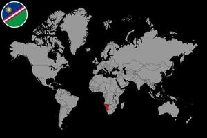 nålkarta med Namibias flagga på världskartan. vektor illustration.