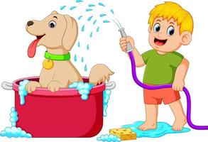 Ein Junge putzt seinen braunen Hund im roten Eimer mit Wasser und Seife vektor