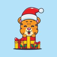 süßer leopard mit weihnachtsgeschenk. nette weihnachtskarikaturillustration. vektor