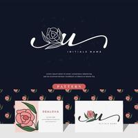 handschrift buchstabe u logo design mit rose vektor