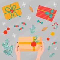 frauenhände packen ein geschenk auf den tisch, draufsicht. Prozess des Verpackens von Weihnachtsgeschenkboxen vektor