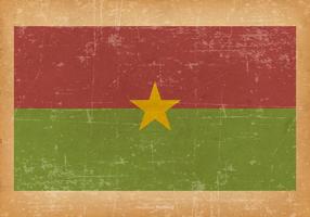 Flagge von Burkina Faso auf Grunge Hintergrund vektor