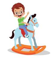 Lycklig pojke svängande på leksak häst vektor