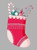 jul strumpa med gåvor och söt vinter- grejer vektor