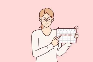 junge frau zeigt mit dem finger auf den kalender mit markierungen, die zeitmanagement empfehlen oder auf das datum achten. mädchensekretärin in brille kündigt wichtiges bevorstehendes ereignis an. flache vektorillustration vektor