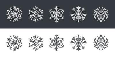 snöflingor. snöflingor i platt stil på svart och vit bakgrund. vektor illustration