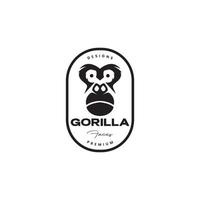 ansikte gorilla chock bricka årgång logotyp design vektor