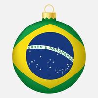 Christbaumkugel mit Brasilien-Flagge. Symbol für Weihnachtsferien vektor
