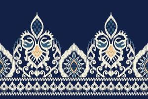 ikat florale paisley-stickerei auf marineblauem hintergrund.geometrisches ethnisches orientalisches muster traditional.aztec style abstract vector illustration.design für textur, stoff, kleidung, verpackung, schal, sarong.