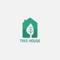 grön hus logotyp med träd negativ Plats. vektor