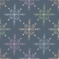 sömlös mönster med klotter flerfärgad snöflingor på en grå bakgrund. vektor hand dragen illustration. eps10