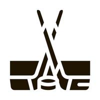 Eishockeyschläger und Shim-Symbol Vektor-Glyphen-Illustration vektor