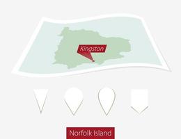 böjd papper Karta av norfolk ö med huvudstad kingston på grå bakgrund. fyra annorlunda Karta stift uppsättning. vektor