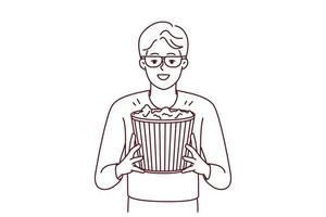 Lycklig ung man i 3d glasögon och popcorn i händer njut av helgen i film teater. leende kille med mellanmål innan filma i bio. vektor illustration.