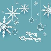 papper skära glad jul text med hängande grannlåt och snöflingor dekorerad på blå bakgrund. vektor