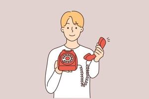 leende man innehav retro fast telefon telefon erbjudande till göra ringa upp. Lycklig kille med sladdad telefon föreslå talande. vektor illustration.