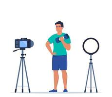 Mann gekleidet im Sport Kleider tut Übungen mit Hanteln Aufzeichnung Video mit Kamera auf Stativ. Sozial Netzwerk bloggen, gesund Lebensstil Konzept. Sport zittern. Vektor Illustration.