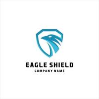 Adler und Schild Logo Design. Vogel, Falke oder Falke Kopf Abzeichen Emblem Vektor Symbol