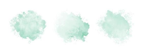 satz abstraktes mintgrünes aquarellwasserspritzen auf einem weißen hintergrund
