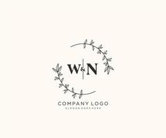 första wn brev skön blommig feminin redigerbar förhandsgjord monoline logotyp lämplig för spa salong hud hår skönhet boutique och kosmetisk företag. vektor