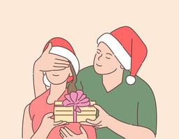 Weihnachten, Geschenk, Silvester Konzept. junger glücklicher Mann hat Überraschung für seine Freundin vorbereitet. vektor