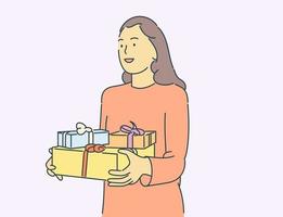 jul eller nyår koncept. glad ung flicka eller kvinna håller lådor med gåvor hemma. vektor