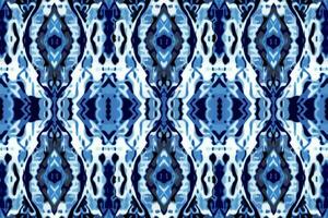 Stoff Textil- Ikat geometrisch Folklore Ornament nahtlos Muster Blau Ton. abstrakt Grafik Linie ethnisch traditionell Volk Antiquität Stammes- modern aufwendig Luxus elegant minimal Jahrgang retro Stil. vektor